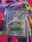 Meowth 106/094 Me02: Phantasmal Flames Holo