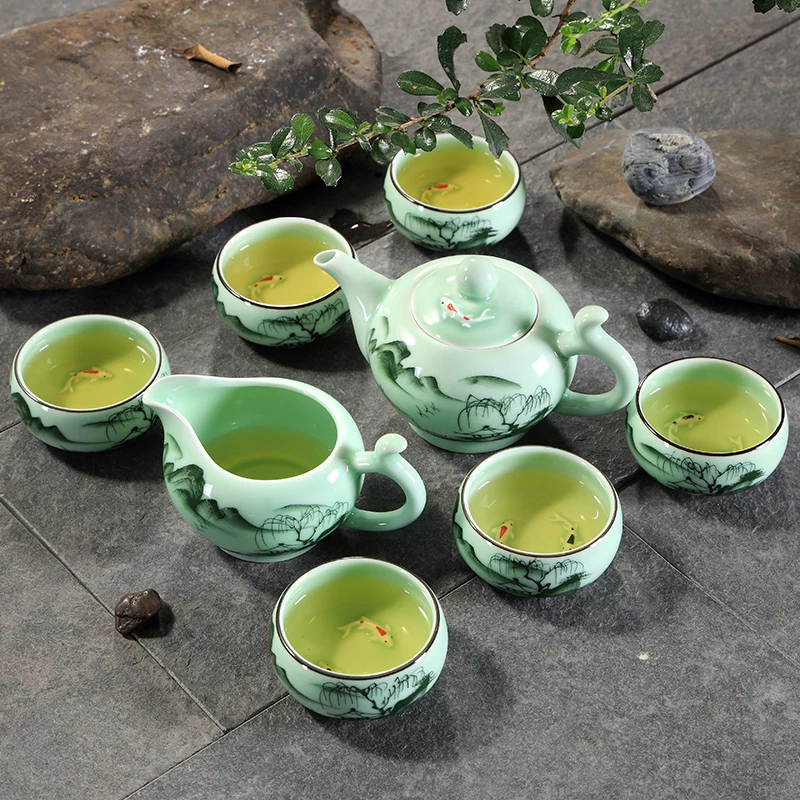 Juego de té longquan celadon kungfu pintado a mano bajo esmalte tetera pescado tazas talladas Foto 4 de 4
