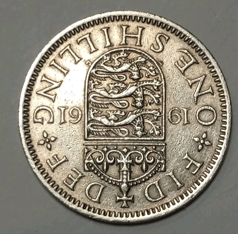 Moneda de 1 chelín británica vintage 1961. No importa cómo se convierta en lo que dice 1961 Foto 2 de 4