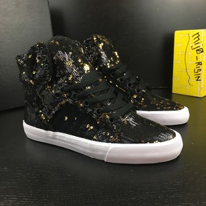 supra black and gold high tops