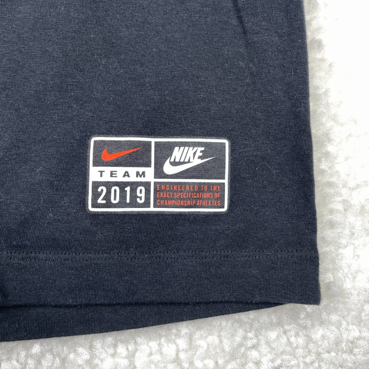 broken nike swoosh t shirt