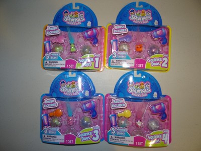2010 Squinkies - Squinkie Doos Series 1,2,3,4.  Lot of Four, New in Packages!