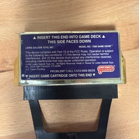 Nintendo NES Game Genie with Original Booklet Missing Back Cover