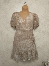Express Women's Dress. Beige And White Spotted Ruffle Trim. Size Medium