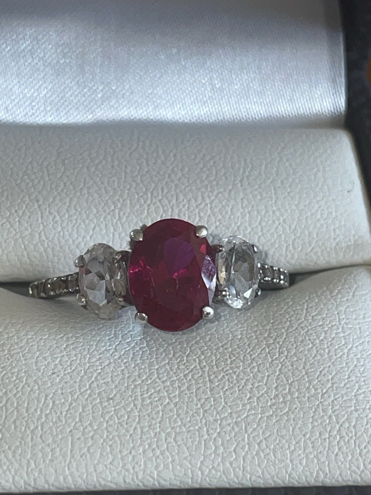 Oval Cut Lab Created Ruby with Two Synthetic Whit… - image 1