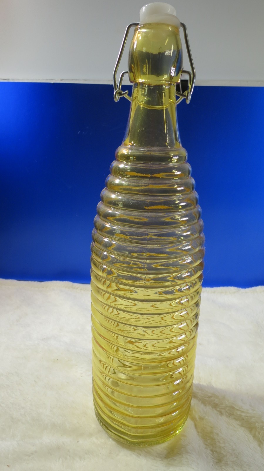VINTAGE  AMBER YELLOW RIDGED DESIGNED  GLASS BOTTLE SIZE 12"