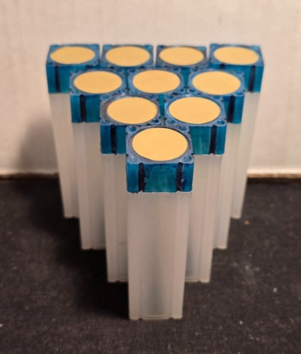 Pre-owned decorated Set of 10 Numis Square Plastic Coin Tubes for U.S. pennies.
