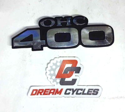 NEW OEM KAWASAKI KZ400 RIGHT SIDE COVER EMBLEM OHC 56018-177 NOS