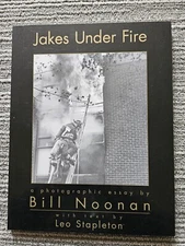 JAKES UNDER FIRE: A PHOTOGRAPHIC ESSAY By Bill Noonan book Signed Inscription