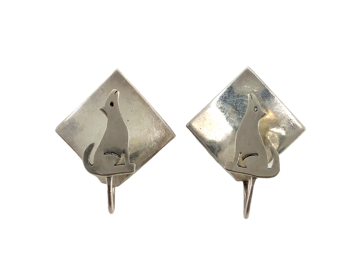 Vintage diamond shaped sterling silver with Howling Wolf stud