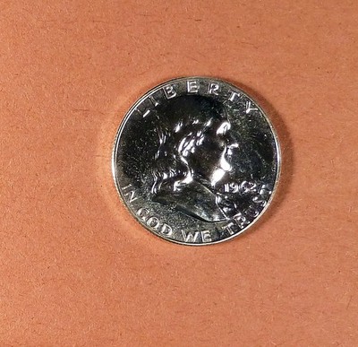 1962 Franklin Half Dollar grades Gem Proof, Toning. Looks Much Nicer than Photo.