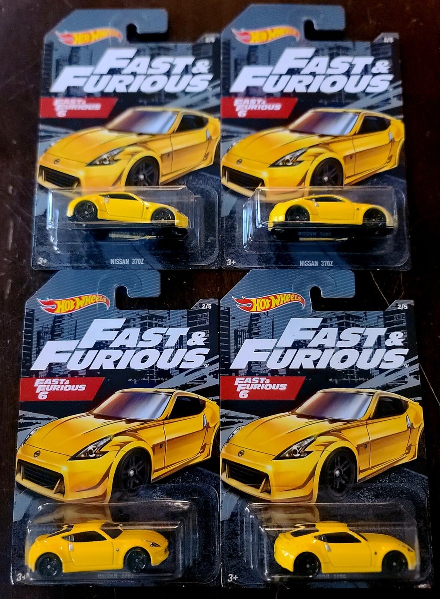 Hot Wheels Nissan 370Z イエロー Amazon.com: Hot Wheels Nissan 370Z Vehicle 1:64 Scale Car