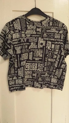 Mädchen H&M-T-Shirt, schwarz-weiß gemustert, Gr.146/152, kurzarm - Bild 1 von 3