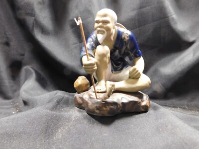 Mudmen Figurine - Asian Man Sitting with rod  (24-04-002)