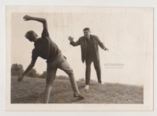 Young Man Dodging’ While Older Throws Some Serious Moves on the Hill Snapshot