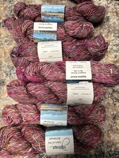 7 skeins weighing 50 grams each of single ply 75 merino and 25 silk.