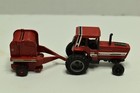 Ertl 1:64 International 5088 tractor & 2400 Round Baler — photo 1