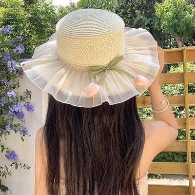 Chapeau soleil été femme en paille naturelle avec large bord et détail fleur - Photo 1/4