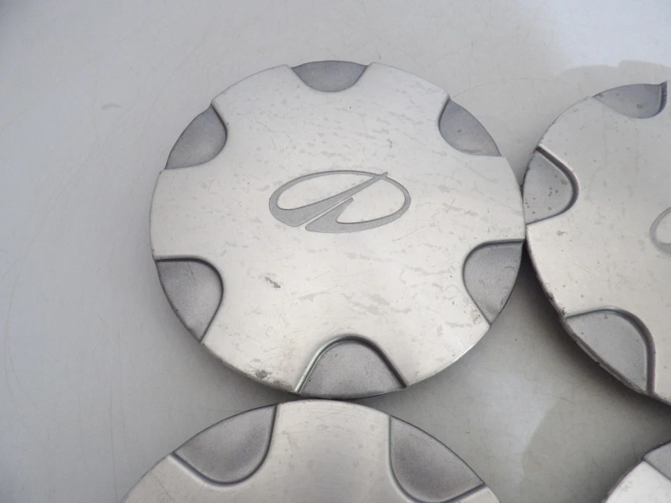 JUEGO DE 4 TAPAS CENTRALES DE LLANTAS DE ALEACIÓN OEM Oldsmobile Bravada 1998 1999 2000 - 2001 Foto 2 de 4