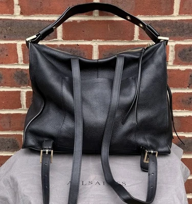 AllSaints Sac à Dos Femme Cuir LAURENCE Noir Sac Motard All Saints Sac à Dos - Photo 1/4