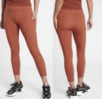 Athleta Ultimate Capri Length Stash Pocket 7/8 Rust Colored Leggings SIZE SMALL
