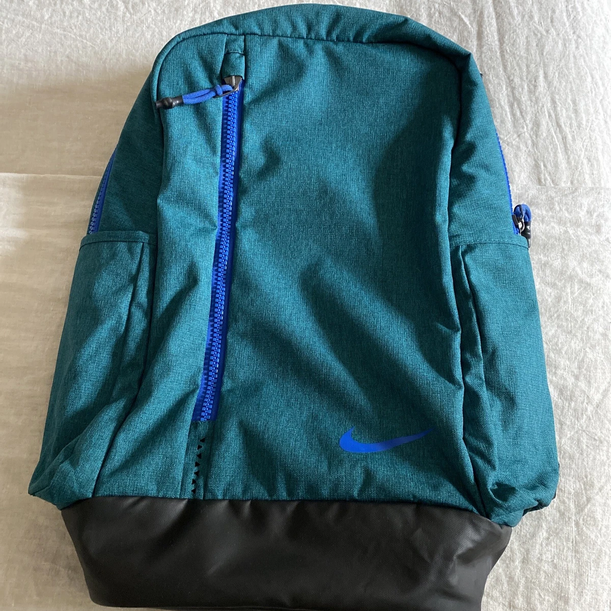 Blue and green nike backpack outlet