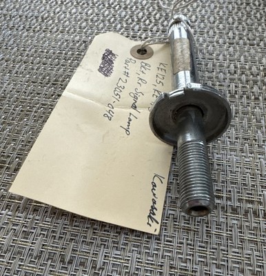 OEM NOS KAWASAKI REAR SIGNAL LIGHT BRACKET (23051-048) KE KS 125