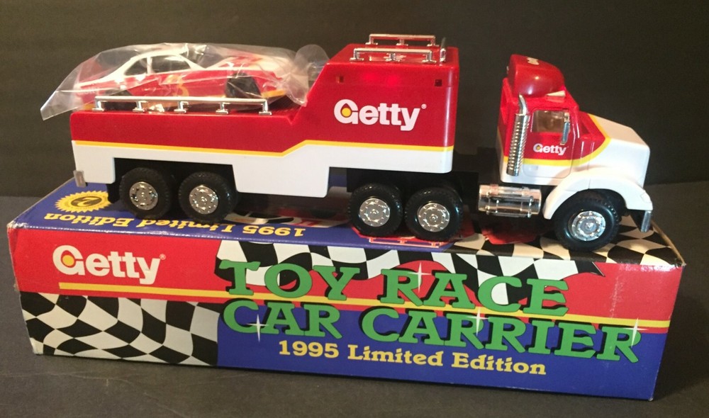 1995 GETTY Toy Race Car Carrier - working lights & sounds w/friction motor car
