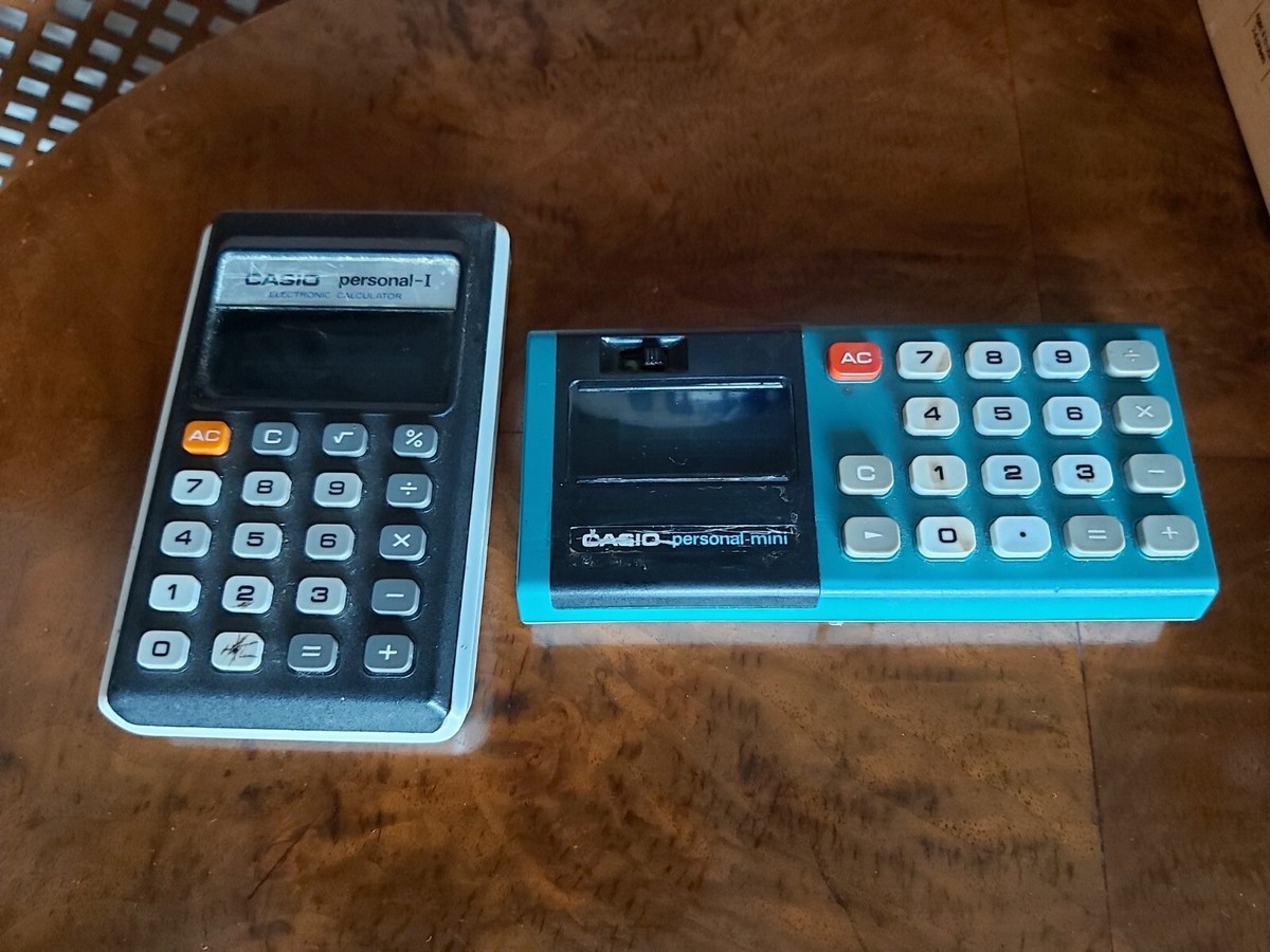Vintage Casio Personal Mini Calculator green Vacuum Display 1974
