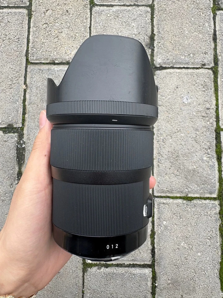 Lente Sigma 35 mm f/1,4 DG HSM Art Prime para montura Canon EF / para Nikon F- 95 % nueva Foto 3 de 4