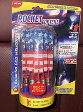 Rocket Copters AS SEEN ON TV 6 LED Helicopters 3 Slingshot Launchers up to 120ft