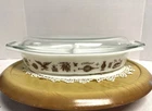Vintage Early American Pattern Pyrex 1.5-quart divided casserole dish with lid