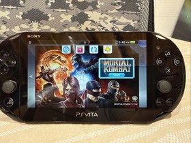 PS Vita PCH-2001 Black: 4GB With Camo Case And Mortal Kombat Loose