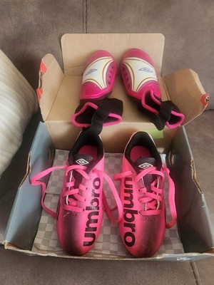 Umbro youth outdoor soccer shoes with matching shin guards, size US 11