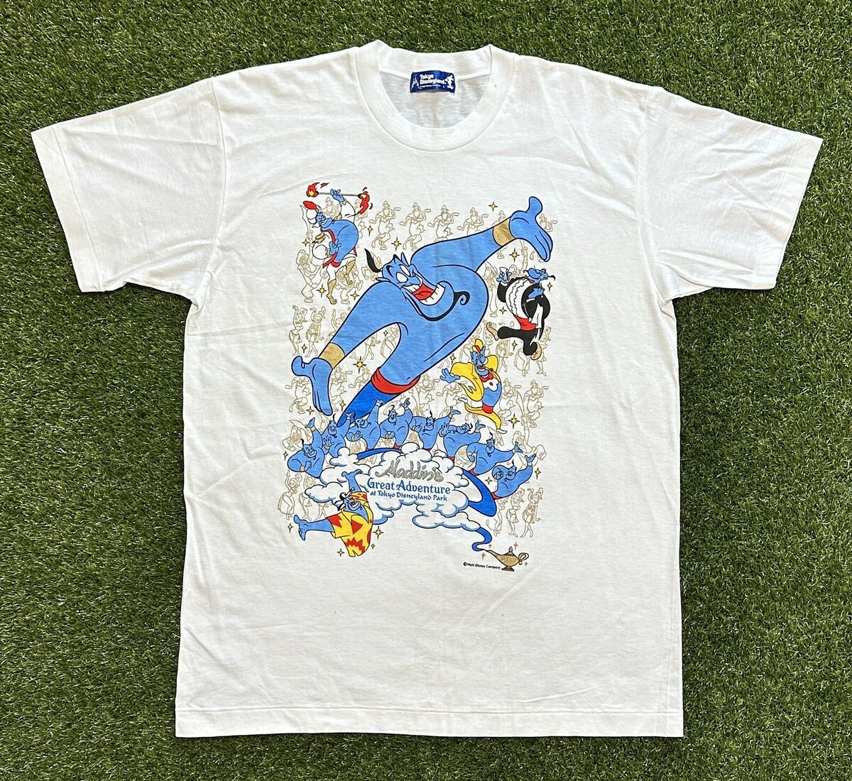 Vintage 90s Tokyo Disneyland Aladdin Genie Print T-Shirt Vintage 90s Tokyo Disneyland Aladdin Genie Print T-Shirt