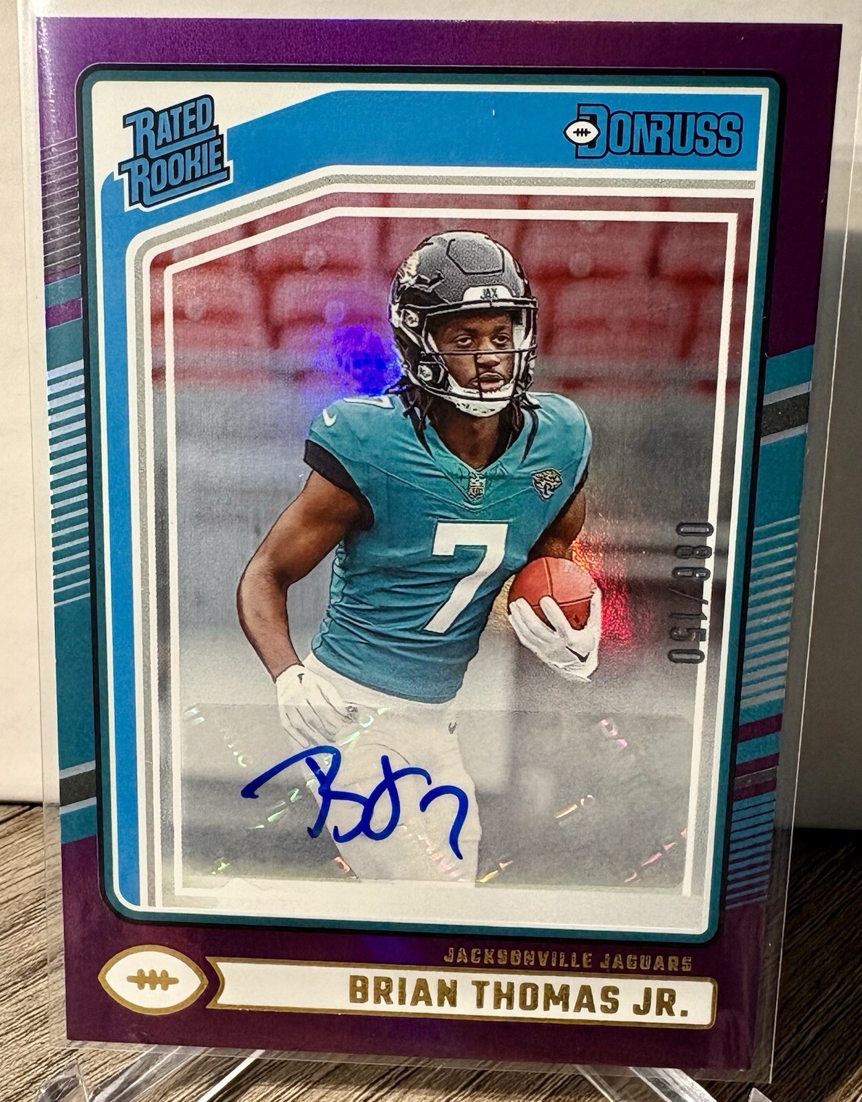 2024 Donruss Brian Thomas Jr. #313 Purple Rated Rookie Auto /150 Jaguars