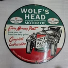 WOLF'S HEAD MOTOR OIL 29 X 29 INCHES PORCELAIN ENAMEL SIGN