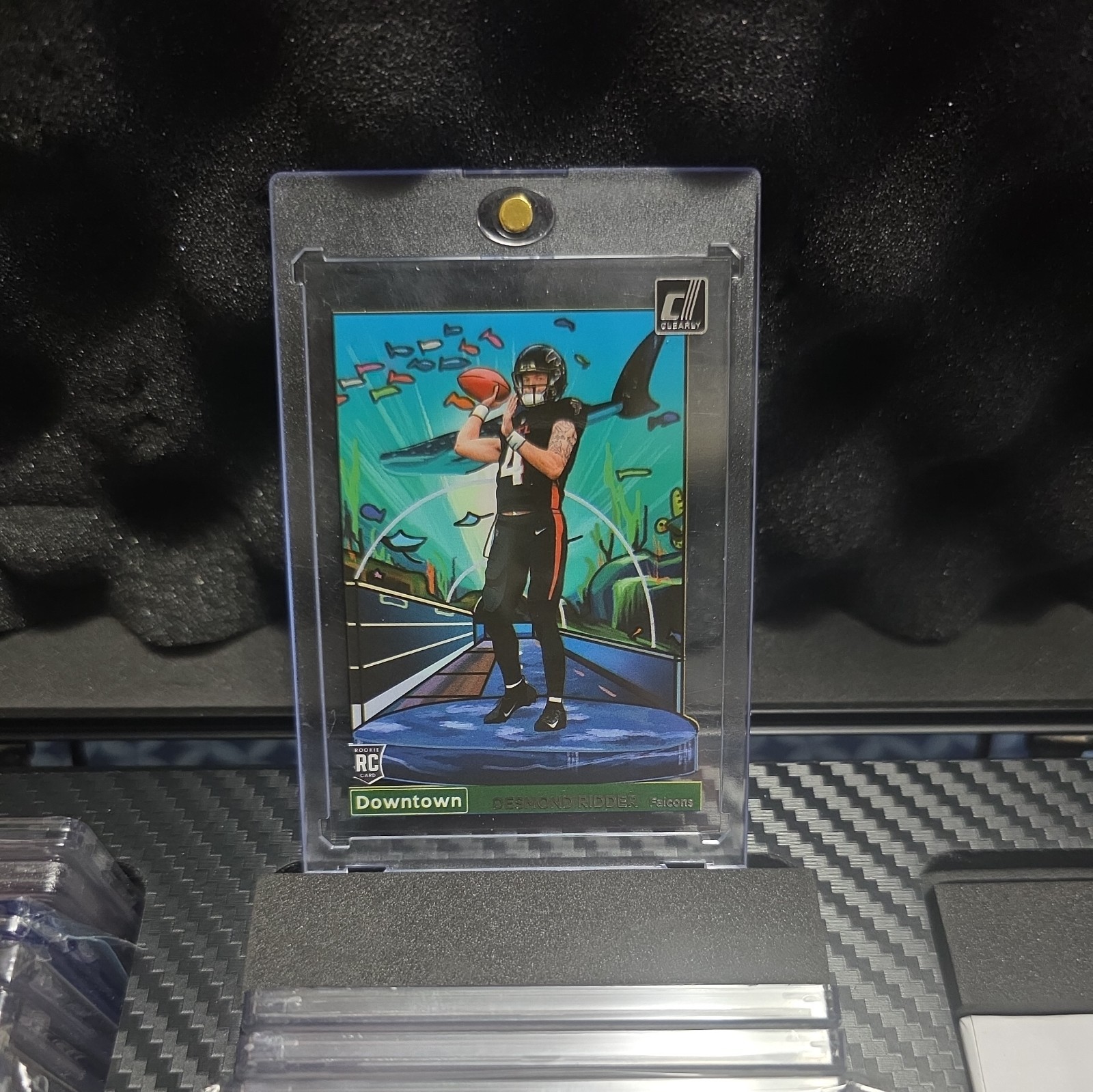Desmond Ridder #DT-DR Football Cards 2022 Panini Clearly Donruss Downtown trading card — raw and PSA graded price guide
