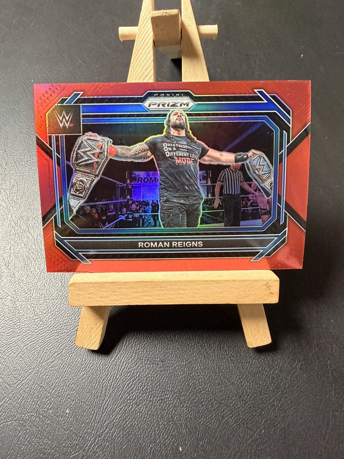 2023 Panini Prizm WWE Roman Reigns Red #/299 #29