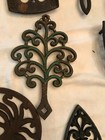 LOT OF 12 CAST IRON TRIVETS ASSORTED — photo 6
