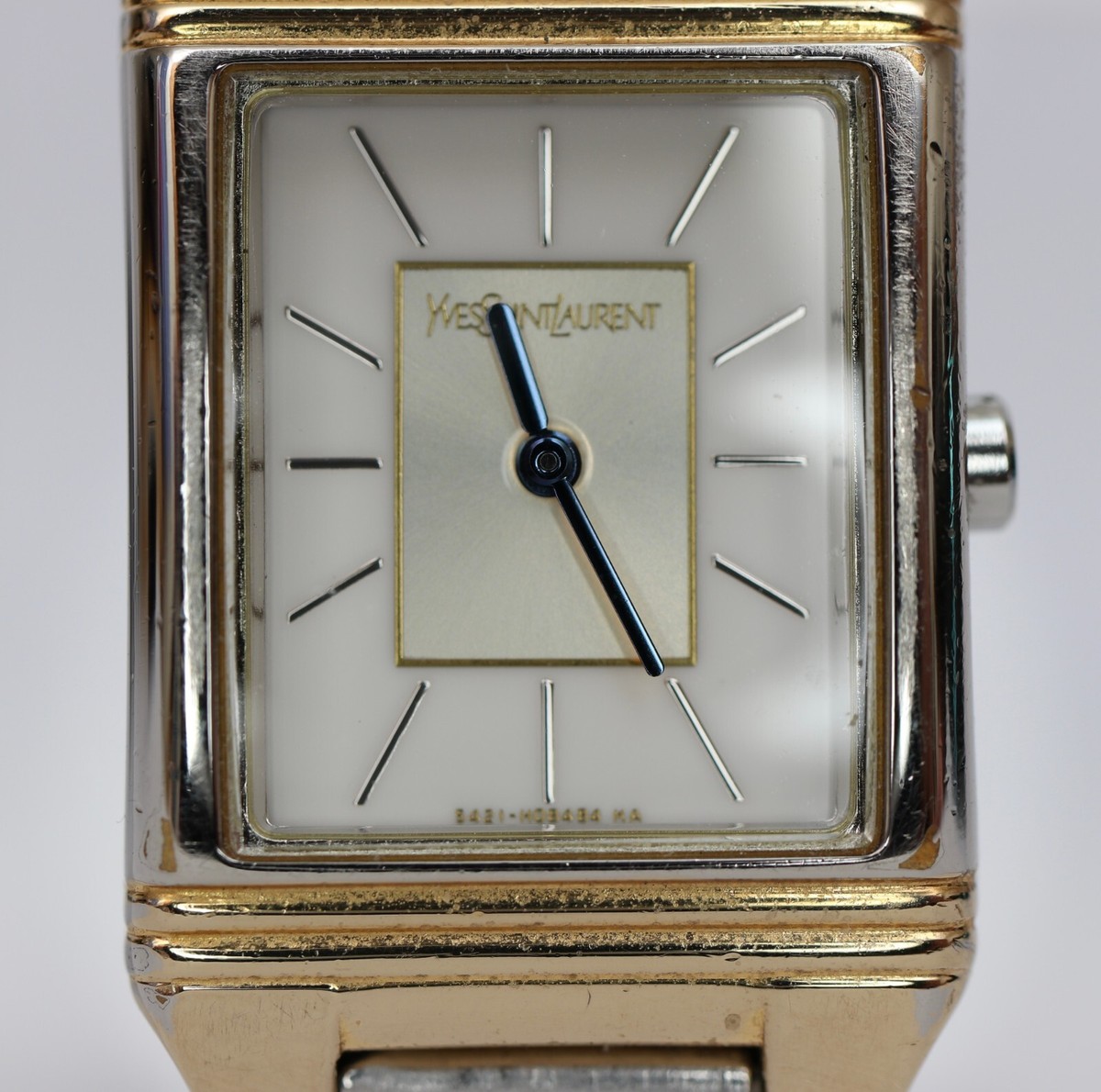Yves Saint Laurent Silver & Gold Square Watch Working for Yves Saint Laurent Silver & Gold Square Watch Working for
