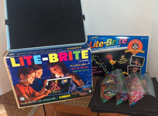 Vintage 1967 Lite Brite with Looney Tunes refill pages extra pegs