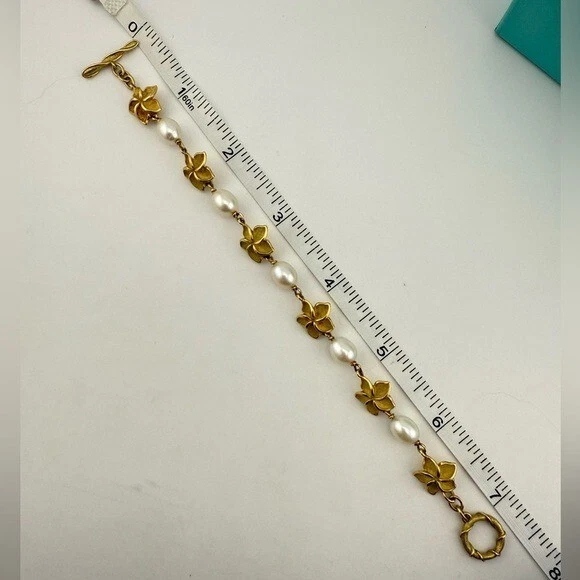 RARO De Colección. Pulsera Tiffany & Co. Oro Amarillo 18k Perlas y Plumeria 17g 🌸 Foto 4 de 4