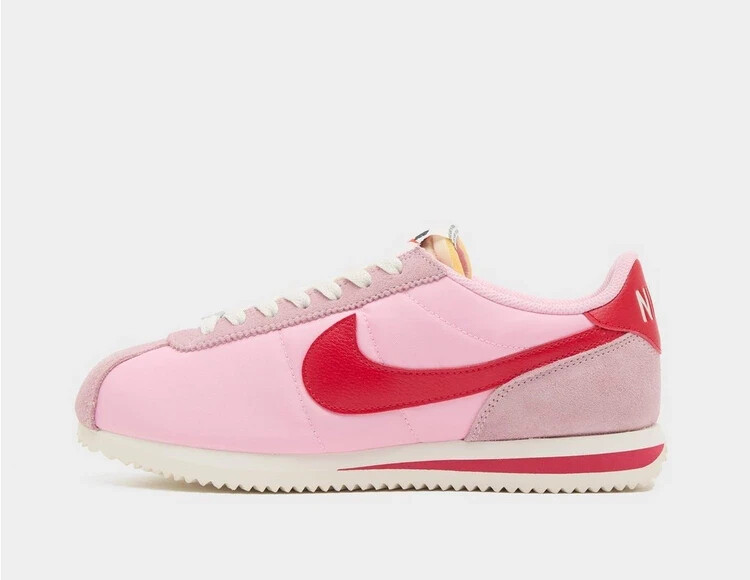 pink and red nike trainers