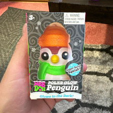 Nee Doh Squishmas Polar Glow Penguin Glows in the Dark Squeeze Toy, Pink