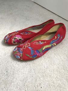 red embroidered shoes