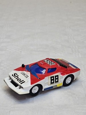 ARTIN LANCIA STRATOS TURBO 1:32 VINTAGE SLOT CAR SHELL HEUER NR. 598 Mängel
