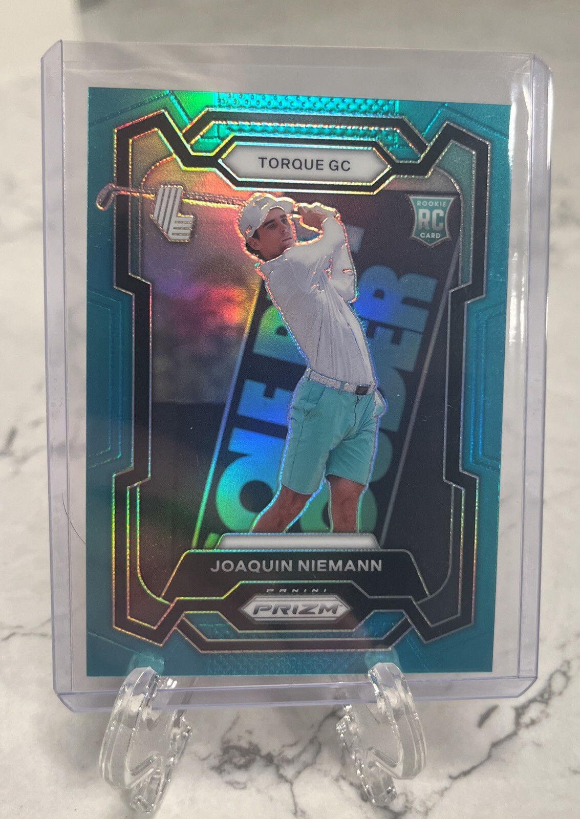 2024 Panini Prizm LIV Golf Joaquin Niemann Teal 115/199 Rookie Card