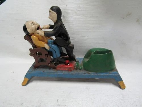 Vintage Cast Iron Dentist Chair Pulling Teeth Coin Bank