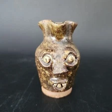 Mini Jug folk art Ugly Face Pottery Signed MDF NC '94' size 2.5'' T x 1.5'' W